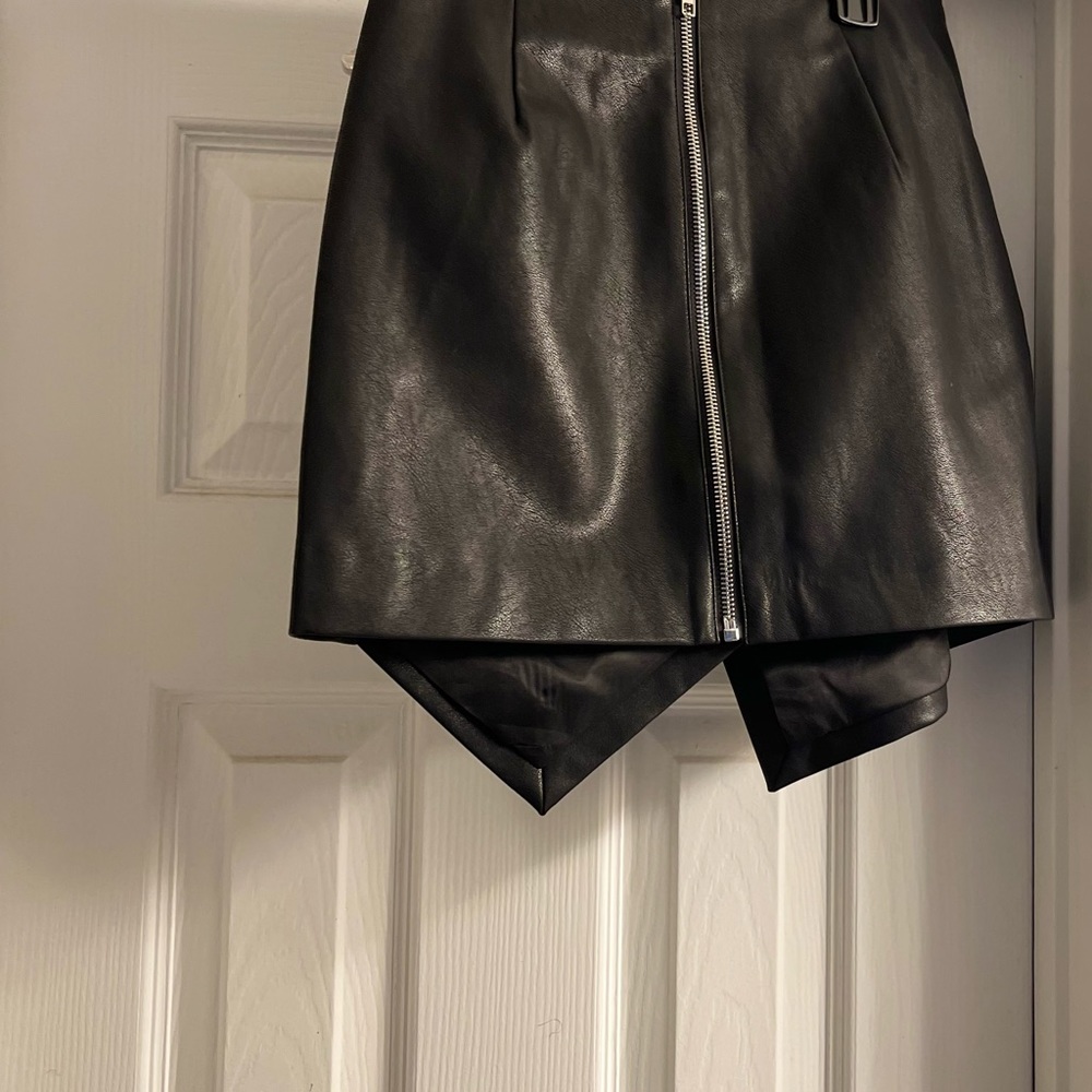 Faux leather forever 21 skirt. Very cute still with tags